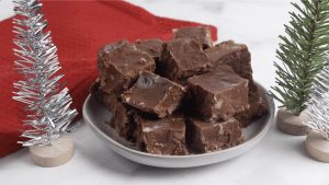 Bite size pieces of fudge on a plate.