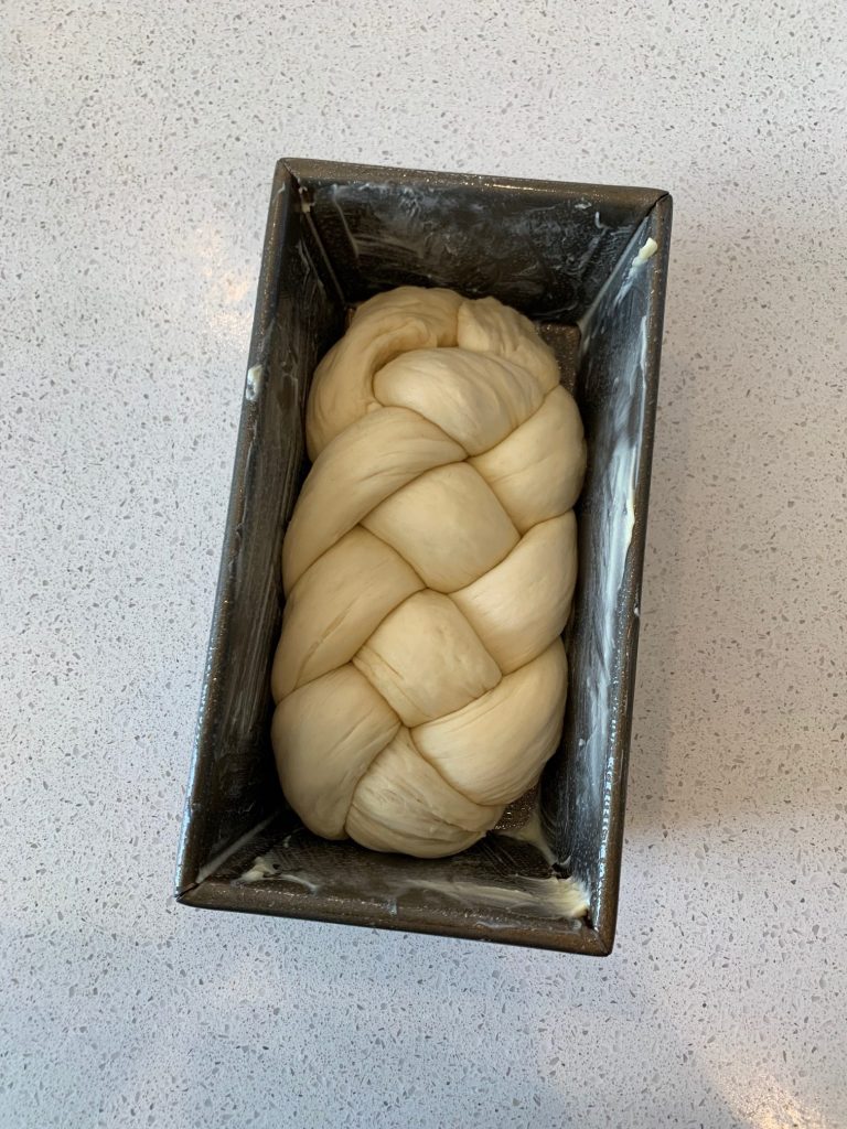 Swiss braided bread dough in dough pan.